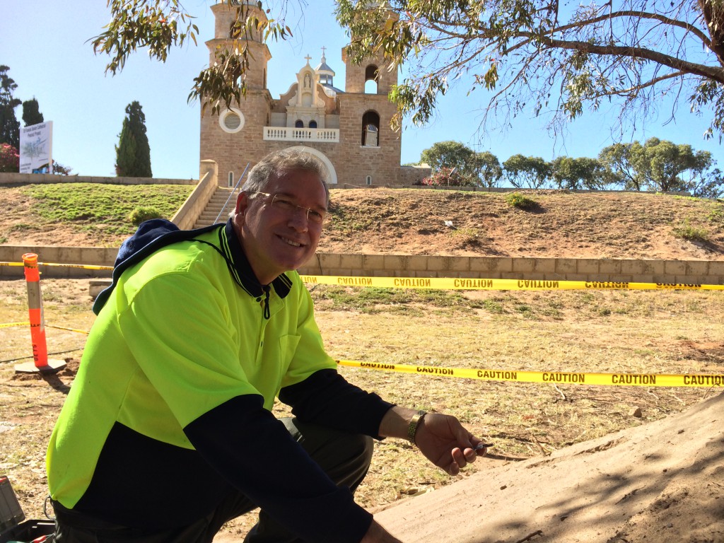 Fr Robert Cross at the historic dump site next to St Francis Xavier Cathedral in Geraldton. PHOTO: ABC