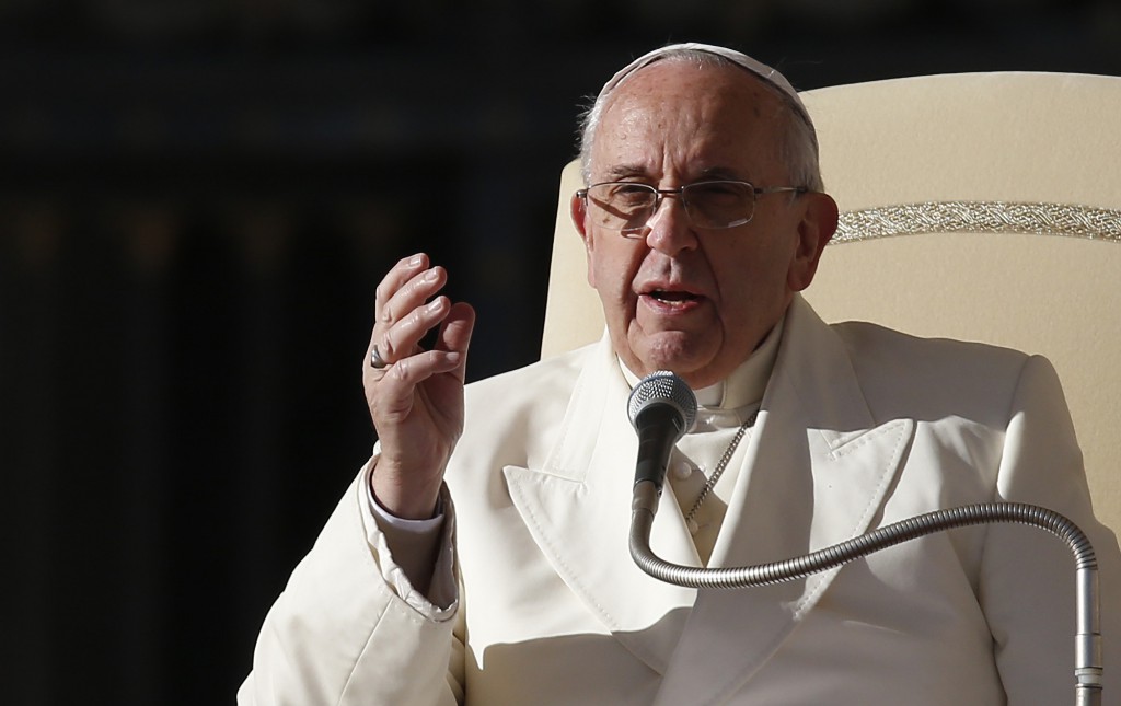 Pope Francis speaks as he leads his general audience in St. Peter's Square at the Vatican Dec. 10. In his talk, the pope reviewed the October extraordinary Synod of Bishops on the family. PHOTO: CNS/Paul Haring