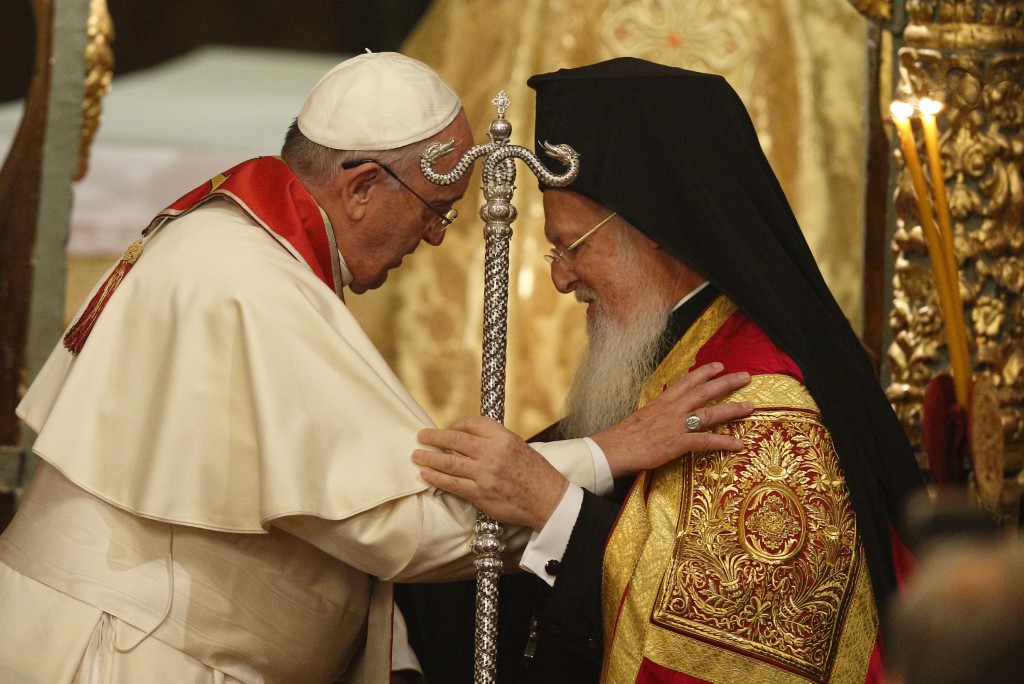 Pope Francis and Ecumenical Patriarch Bartholomew of Constantinople embrace during a prayer service in the patriarchal Church of St. George in Istanbul Nov. 29. PHOTO: CNS/Paul Haring