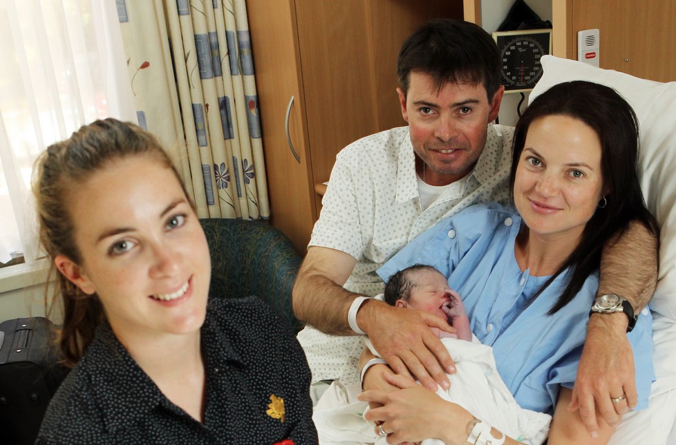 Pippa Mae was born at St John of God Subiaco Hospital to Hayley and Clint Wisewould on the day St John of God Health Care celebrated 10,000 babies born in its hospitals in 2014.  Midwife Verity Bradley presented gifts to recognise the occasion for the happy family and the significant milestone for St John of God Health Care. PHOTO: St John of God Health Care