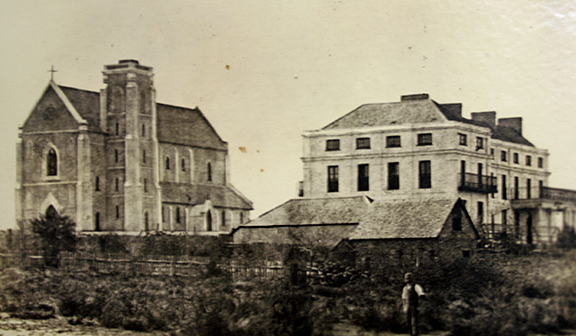 St Mary's Cathedral (left) and the Archbishop's Palace (right) at Victoria Square in 1865. PHOTO: File