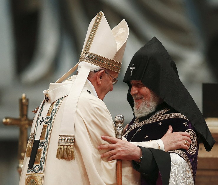 Pope Francis embraces Catholicos Karekin II of Etchmiadzin, patriarch of the Armenian Apostolic Church, during an April 12 Mass in St. Peter's Basilica at the Vatican to mark the 100th anniversary of the Armenian genocide. PHOTO: CNS/Tony Gentile, Reuters