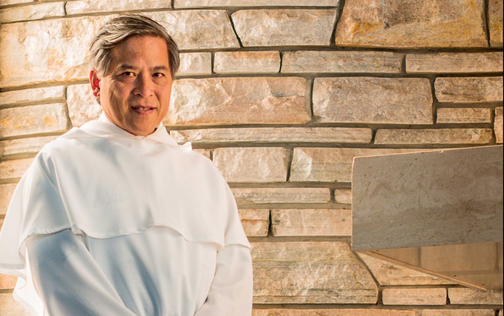 Fr Peter Nguyen OP wearing the traditional Dominican white habit in Our Lady of the Rosary parish in Doubleview. PHOTO: Supplied 