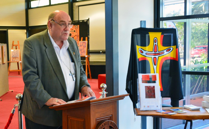 Bishop Christopher Saunders, Catholic Diocese of Broome, speaks at a recent art exhibition entitled "The Balgo Banners and Christof Collection" which was held in Broome between 5-13 July. PHOTO: Supplied