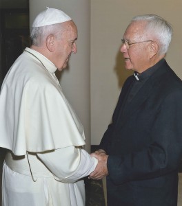 A friendly exchange: Monsignor Michael Keating meets Pope Francis following a Mass at Casa San Marta on Friday, 26 June 2015. PHOTO: Supplied