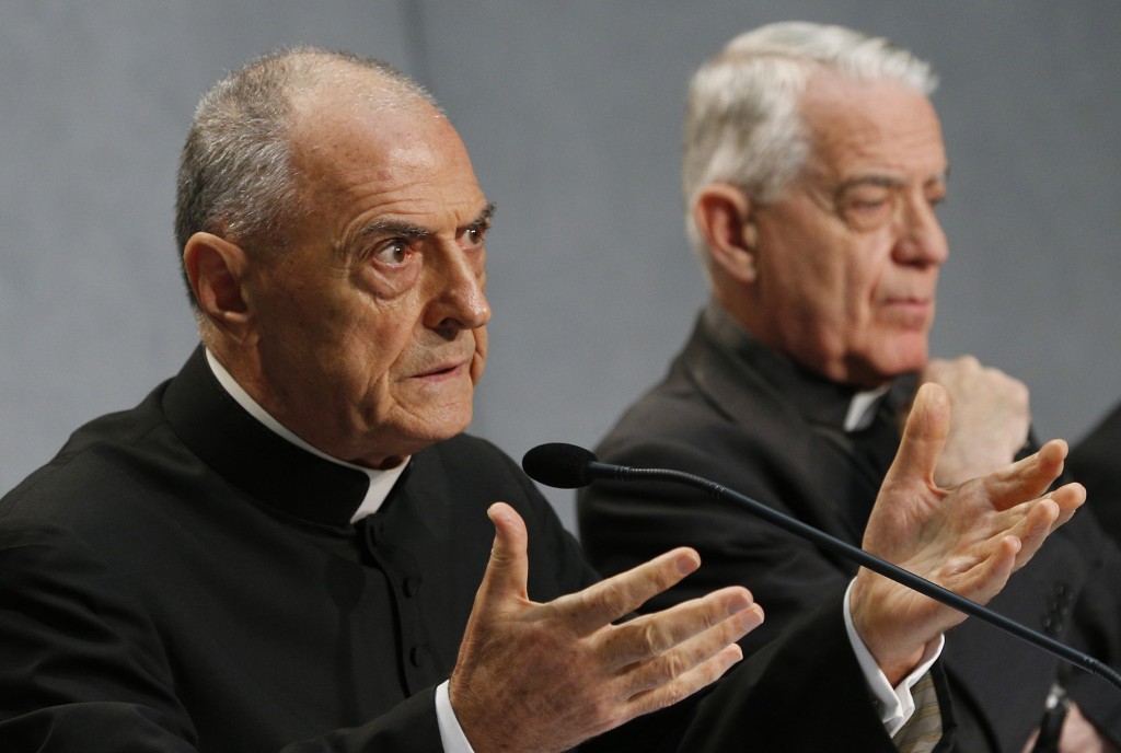 Msgr Pio Vito Pinto, dean of the Roman Rota, a Vatican court, speaks at a press conference for the release of Pope Francis' documents concerning changes to marriage annulments at the Vatican on September 8. Also pictured is Jesuit Father Federico Lombardi, the Vatican spokesman. PHOTO: CNS/Paul Haring.
