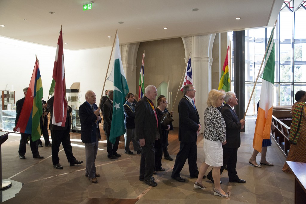 Knights of the Southern Cross process into St Mary’s Cathedral, Perth, holding flags from around the world for the concluding Mass of the International Alliance of Catholic Knights. PHOTO: Supplied