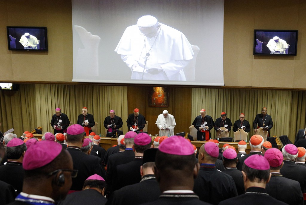 Pope Francis participates in prayer at the opening session of the Synod of Bishops on the family at the Vatican on 5 October 2015. PHOTO: CNS/Paul Haring