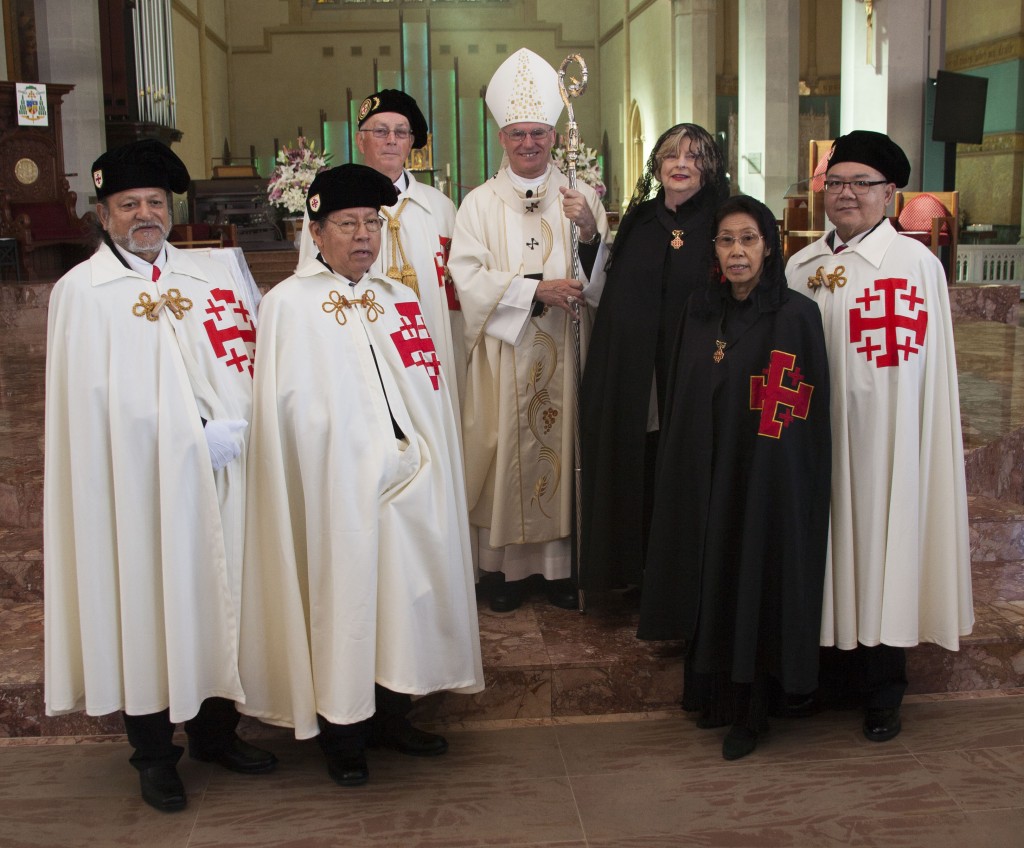 Archbishop Timothy Costelloe, (centre) with new members of the Equestrian Order of the Holy Sepulchre of Jerusalem following their Investiture on September 19 and Jack Gardner, (third from left) Chief Lieutenant of the Order for Western Australia. PHOTO: Jamie O’Brien