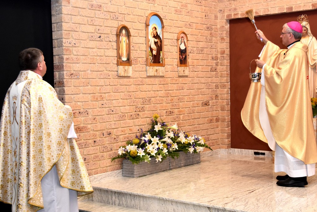 Archbishop Timothy Costelloe blesses the newly installed relics of St Anthony of Padua, St John Paul II and St Mary MacKillop at St Anthony’s Parish, Greenmount, on 7 November 2015. Photo: Supplied