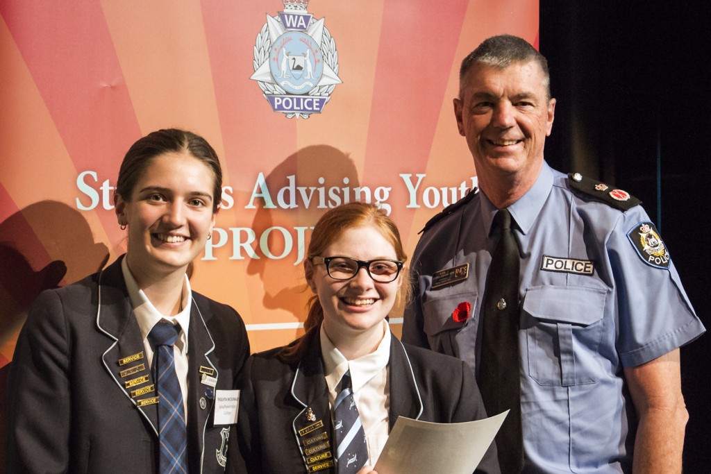 Year 12 Iona Presentation College students Tequita McDonald (left) and Jessica Kerr’s (centre) film The Problems of Alcohol took out first place at the 2015 Students Advising Youth (SAY) Project. Photo: Catholic Education WA.