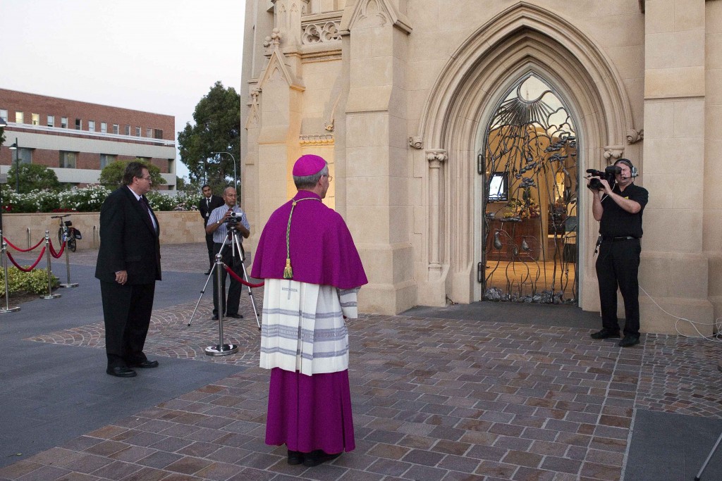 Archbishop Timothy Costelloe prepares to enter the Holy Door at his installation Mass on 21 March 2012. Archbishop Costelloe will this month celebrate the commencement of the Jubilee Year of Mercy with the opening of the Holy Door at St Mary’s Cathedral on 12 December. Photo: Ron Tan