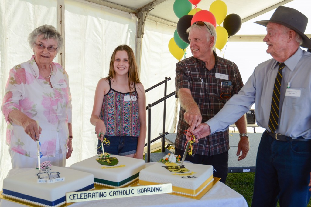 From left to right: Monica Clune (Stella Maris), Chloe Henville (Nagle College), Garry Cripps (SPC) Colin Constantine (CBC) cut one of three cakes at the reunion which signalled the end of an era for Catholic boarding in Geraldton on 10 October 2015.
