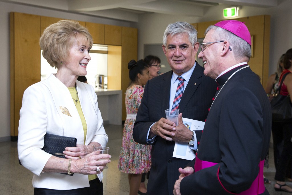 WA Governor Kerry Sanderson and Assistant Minister for Health and Aged Care Ken Wyatt chat to Archbishop Timothy Costelloe at a social function after the Mass. Photo: Ron Tan