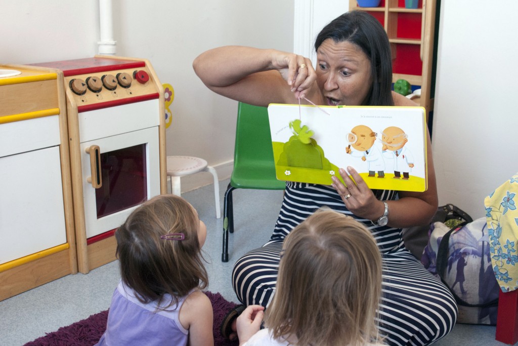 Teacher Sabine Desmond leads children through a French picture book at MercyCare’s Early Learning Centre in Wembley, which has reached full enrolment for its language classes this year. Photo: Rachel Curry