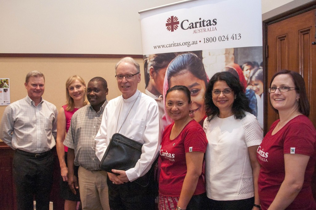 From left to right: Caritas National Council WA Representative, John Bouffler; General Manager of Social Outreach at SJOG Hospital Bev East; speaker David Kawooya; Perth Auxiliary Bishop Don Sproxton; Sr Janet Palafox; Ms Debra Sayce (Catholic Education WA); Caritas Promotions Officer Natalie Weir. Photo: Marco Ceccarelli