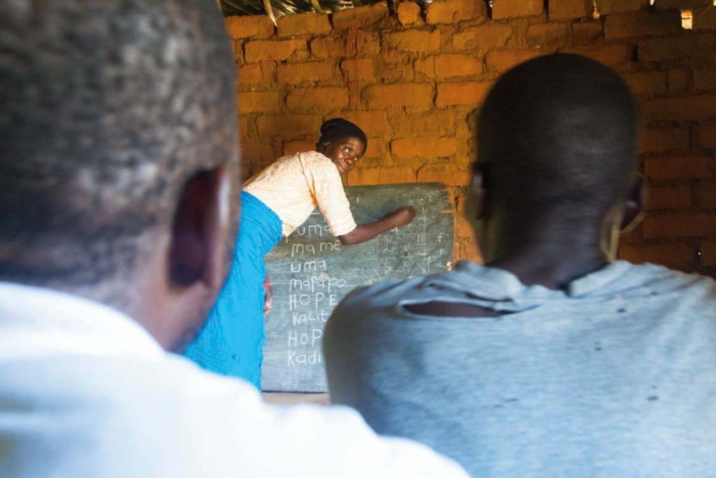 Despite only finishing primary school, Doney’s training in Adult Literacy gave her the skills to teach literacy and numeracy to adults in her village. Photo: Supplied