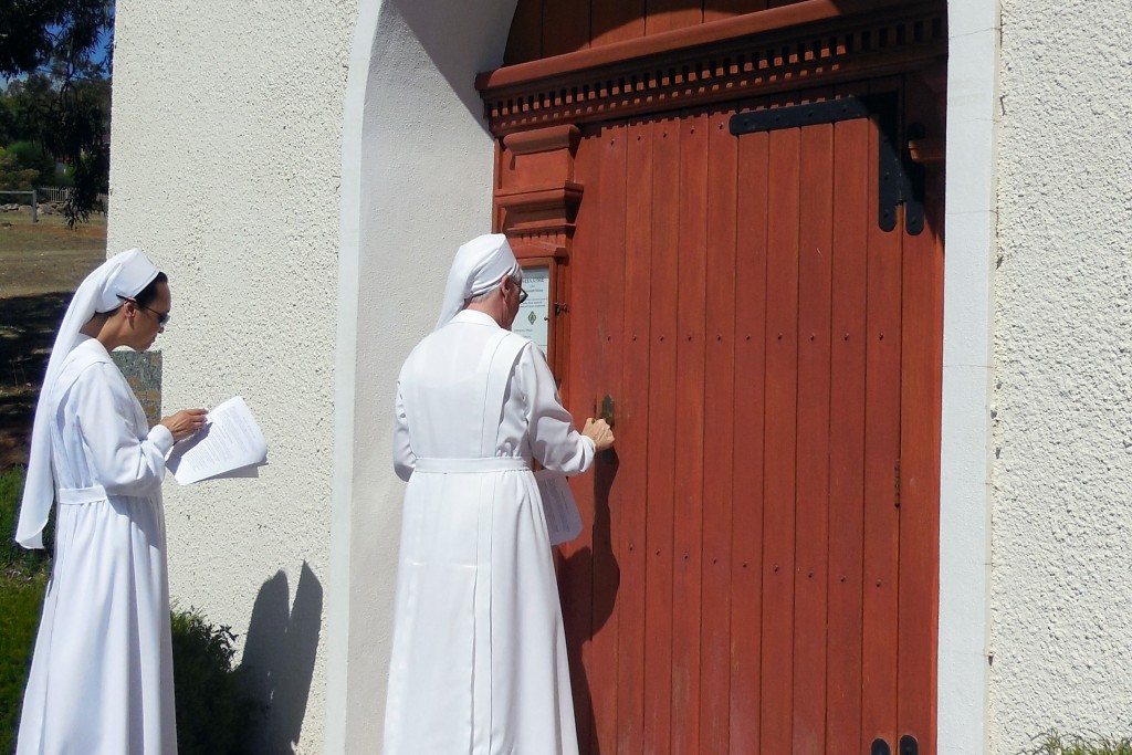 Sisters of the Schoenstatt Shrine in Mt Richon, WA open the Holy Door to their shrine on 13 December 2015. Photo: Supplied