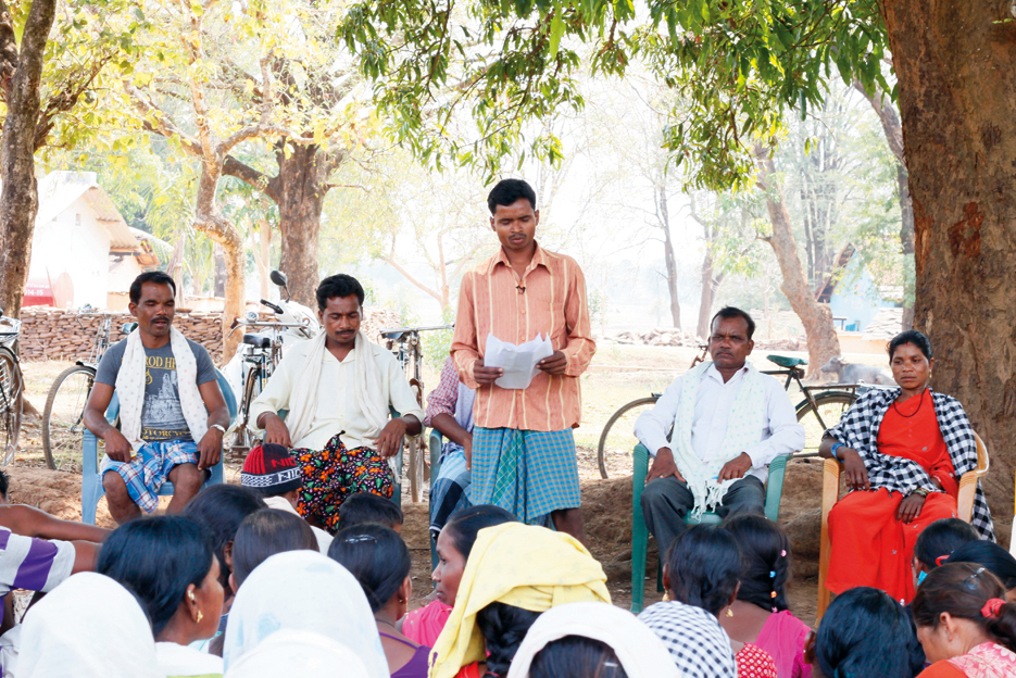 Dhaniram addressing villagers, reading out applications and resolutions put across by villagers to be discussed and passed. ”We are now empowered to speak up and ask for our rights.” Photo: Supplied.