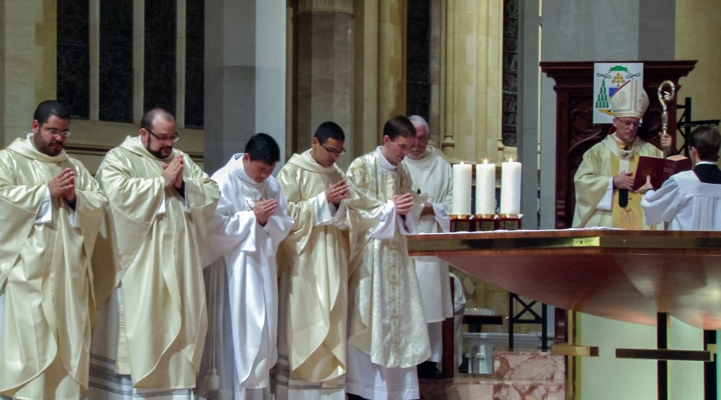 Five young deacons, from left to right, David Adan Ramirez Nieves (Colombia), Giovanni Raffaele (Italy), Jerome Truc Ba Nguyen (Vietnam), Rodrigo Da Cost Ponte (Brazil) and Matthew Hodgson (Australia), were ordained to the priesthood at St Mary’s Cathedral on 4 March 2016. Photo: Mark Baumgarten