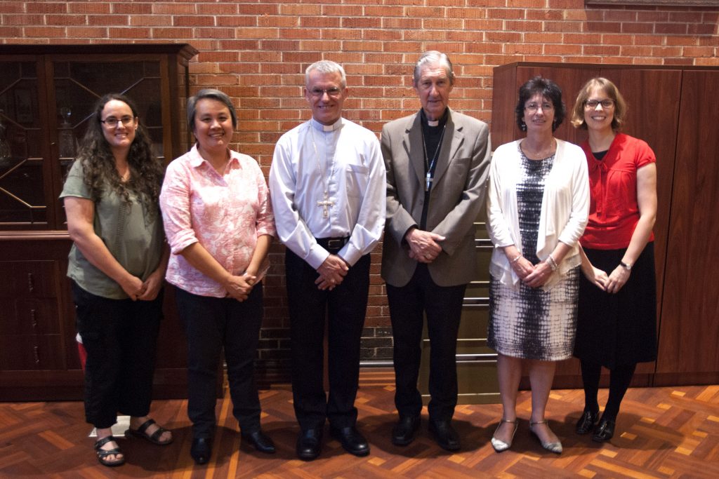 Scholarship recipients Laura Firth and Gem Oliveiro with Archbishop Timothy Costelloe, Emeritus Archbishop Barry Hickey, scholarship recipient Helen Vester and Centre for Faith Enrichment Director, Michelle Jones. Photo: Supplied