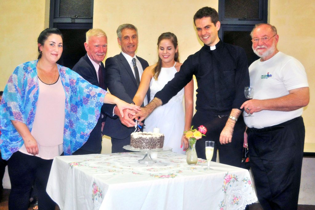 Amanda Dillon, Bruce Ramsay and their fellow neophytes celebrate with Ballajura Assistant Priest Fr Stephen Gorddard and Parish Priest Fr John Jegorow. Photo: Supplied