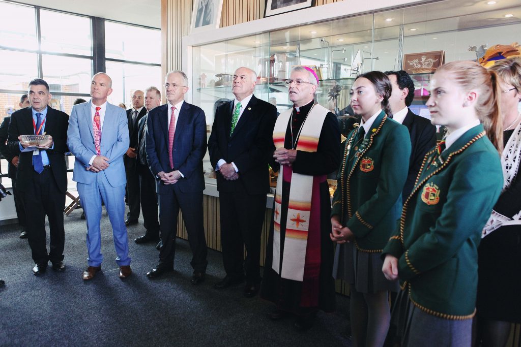 Archbishop Timothy Costelloe, (fifth from left), stands with Catholic Education WA Executive Director, Dr Tim McDonald; Prime Minister Malcolm Turnbull; La Salle College Principal, Wayne Bull; in addition to students from La Salle College, for the opening of the new Brother Fitzhardinge Trade Skills Centre. Photo: Jesse Roberts