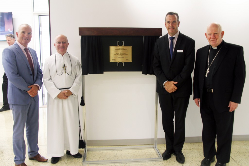 From left, Catholic Education WA Executive Director, Dr Tim McDonald; National Director for Marist Schools Australia, Br Michael Green; Newman College Principal, John Finneran and Bishop Gerard Holohan, from the Diocese of Bunbury, stand next to the plaque for the opening of the new Auditorium at Newman College on Friday 1 April. Photo: Supplied.