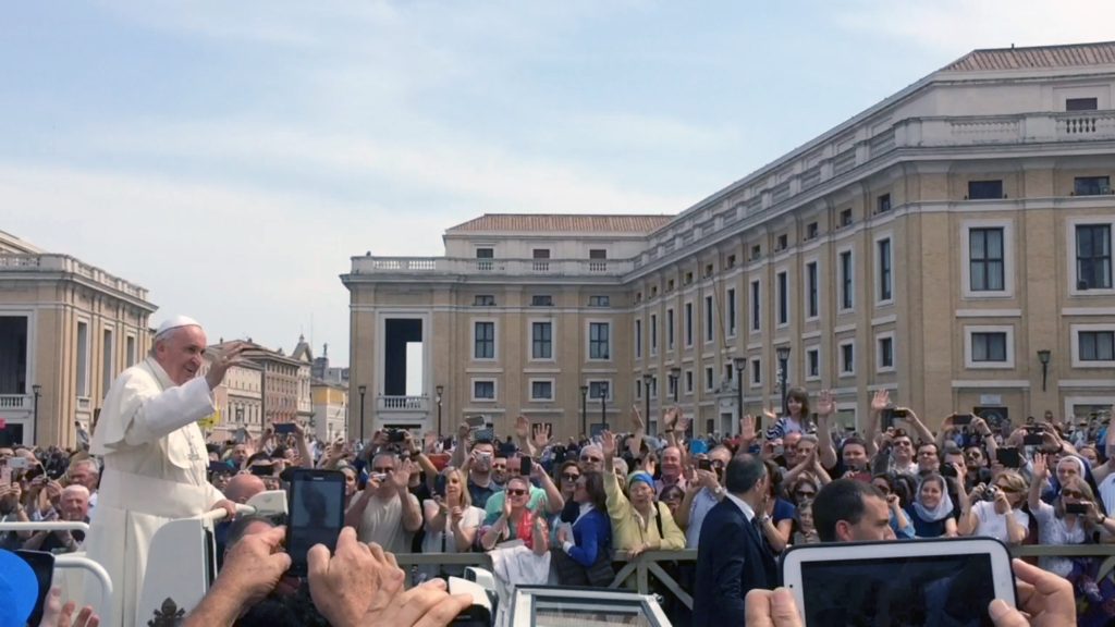 Students were able to snap close-up photos of Pope Francis as the Pontiff completed a lap of Sat Peter’s Square after the Mass. 