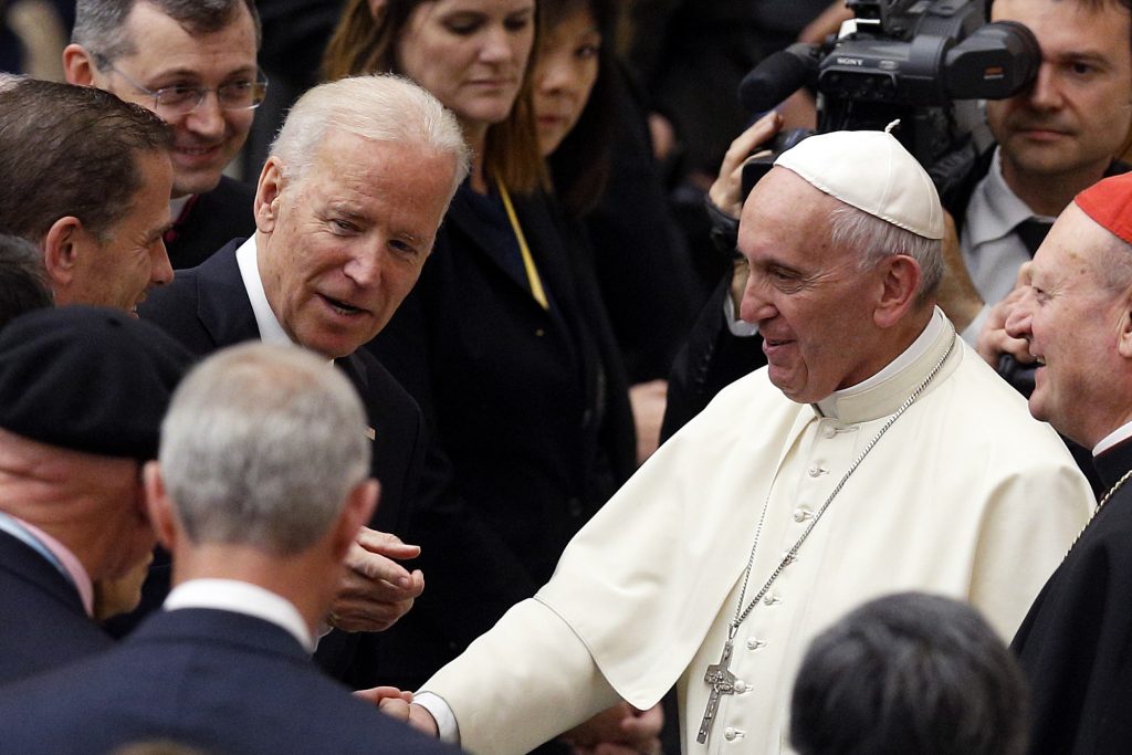 US Vice President Joe Biden gestures as he meets Pope Francis after both leaders spoke at a conference on adult stem cell research at the Vatican on 29 April. Photo: CNS/Paul Haring