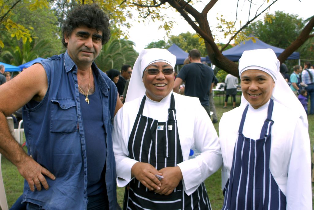 Spud Shed Owner Toni Galati with Srs Elena and Marie Bernard at the Little Sisters of the Poor Food Fair on May 15. Photo: Michael Soh.