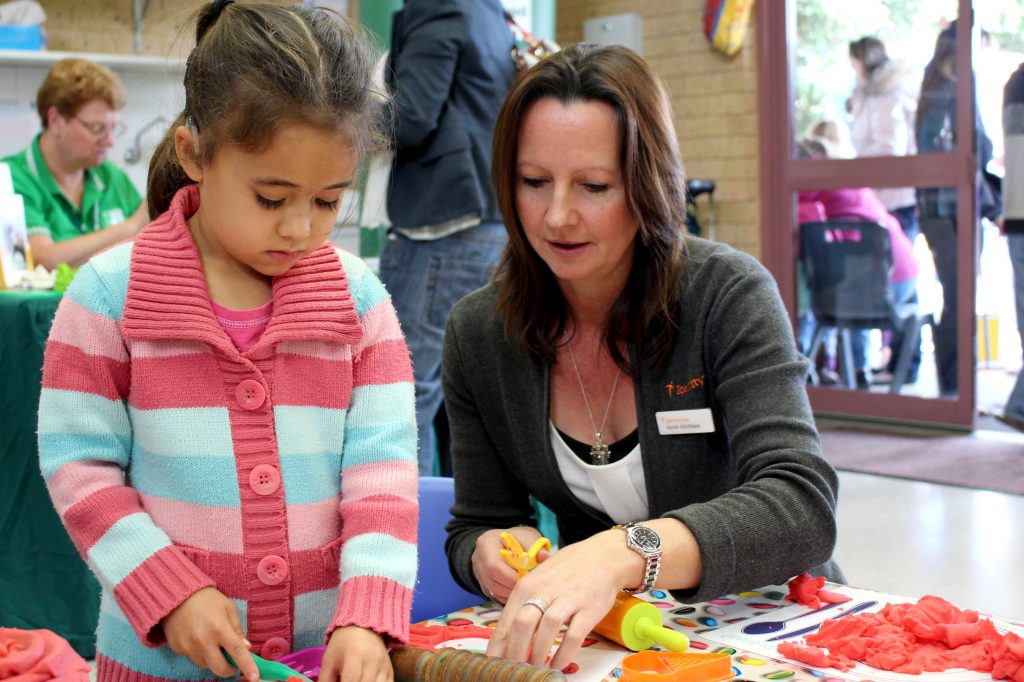 Jocelyn engages in arts and crafts with one of Identitywa’s support workers. Jocelyn and her family have benefited from Identitywa’s new individualised approach that aims to make the organisation’s funding and program more “person-centred”. Photo: Supplied