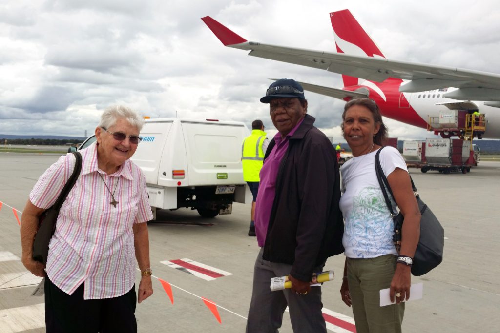 Sr Frances Wilson, Reg Carnamah and Donna Ryder from the Archdiocese of Perth’s Aboriginal Catholic Ministry are in good spirits as they arrive at Alice Springs Airport. Photo: Supplied