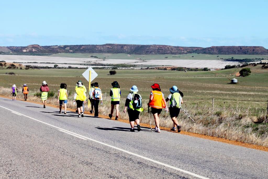 Pilgrims walk along the road during last year’s Camino San Francisco which took place from Friday, 1 to Sunday, 3 May 2015. The Camino was organised by Geraldton Director of Heritage, Fr Robert Cross. Photo: Supplied