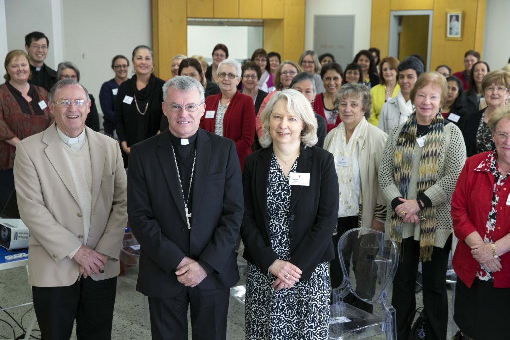 Archbishop Timothy Costelloe, front centre, with Vicar General Fr Peter Whitely, left, and Executive Officer Jennifer Lazberger, right, at the 2015 Parish Secretaries Day. Administrative support has increased for parishes across Perth with the release of updated Parish Guidelines. The new guidelines have been implemented at several information nights across the Archdiocese over the past two weeks. Photo: Jamie O’Brien