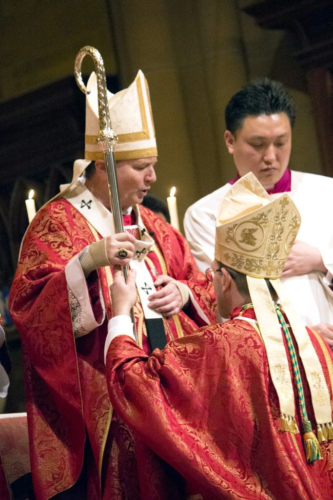 Archbishop Anthony Fisher OP gives a crosier to newly ordained Bishop Anthony Randazzo. Photo: Sourced