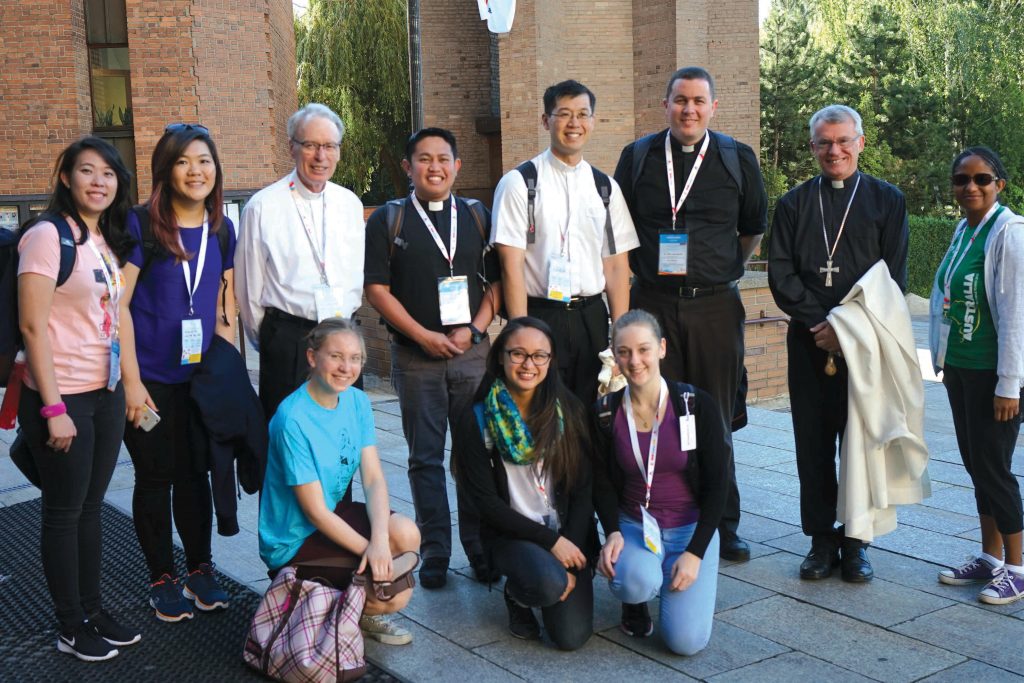 Bishop Don Sproxton, third from left, with Fr Brennan Sia, fifth from left, Fr Mark Baumgarten, and Archbishop Timothy Costelloe, together with youth from Perth during World Youth Day festivities in Poland. Photo: Supplied.
