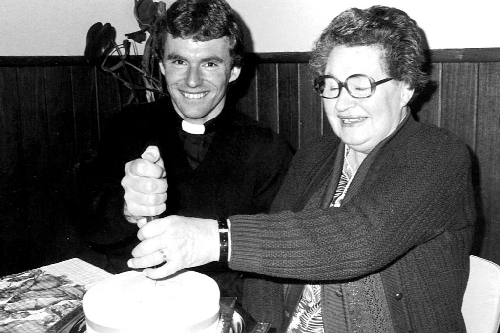Young men discerning their vocation can hear advice from the Archbishop of Perth himself, Timothy Costelloe, in a new video uploaded to the Archdiocesan Vocations Office website. The Archbishop is pictured here with his mother, Carmel, during the celebrations of his final profession in 1985. Photo: Sourced