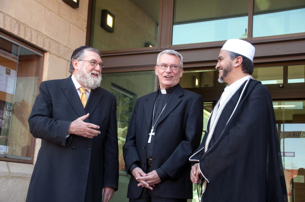 Perth Archbishop Timothy Costelloe SBD, Chief Rabbi of Western Australia, Dovid Freilich OAM, and Imam at Langford Islamic College, Sheikh Muhammad Agherdien, gathered at Notre Dame University’s Fremantle Campus on 13 September for an interfaith gathering titled Abraham Day. Photo: Marco Ceccarelli