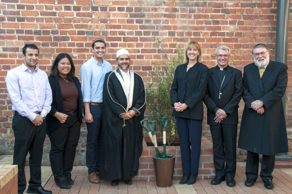 (from left to right) Notre Dame Muslim, Christian and Jewish students Mohamed Al-Hassany, Jodilee Tangarorang and Aharon Freidland pictured with Sheikh Muhammad Agherdien, Professor Celia Hammond, Archbishop Timothy Costelloe and Chief Rabbi Dovid Freilich at Abraham Day. Photo: Marco Ceccarelli