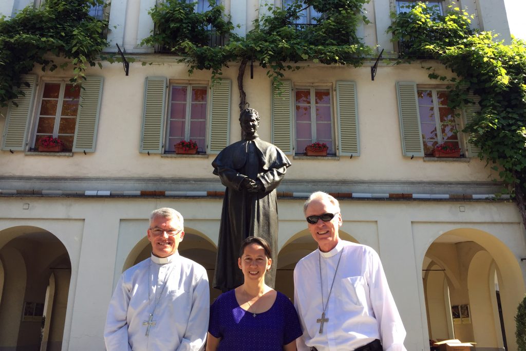 Director of the Catholic Youth Ministry, Anita Parker with Archbishop Timothy Costelloe and Bishop Donald Sproxton with a statue of St John Bosco in Turin. Ms Parker was one of 79 pilgrims who journeyed to Italy and then Poland for World Youth Day in Krakow. Photo: Supplied