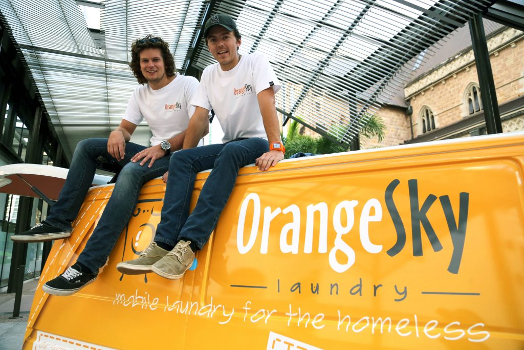 Founders Nick Marchesi and Lucas Patchett with their Orange Sky Laundry van. Photo: Provided