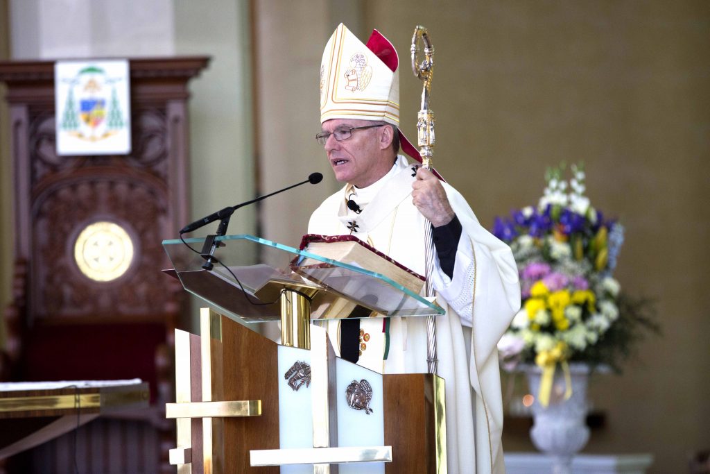 Archbishop Timothy Costelloe recalls the words of Saint John Paul II, ‘Do not be afraid. Thrown open the doors of your heart to Christ,’ during his homily. Photo: Ron Tan