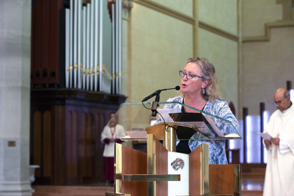 Director of the Justice, Ecology and Development Office, Carol Mitchell, leads the Universal Prayers during the Mass. Photo: Ron Tan