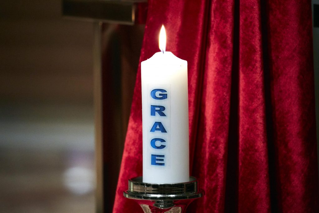 The candle of Grace, symbolic of the forgiveness that God has shown us and the readiness to forgive others which He is calling us to, was lit during the Liturgical Launch. Photo: Ron Tan