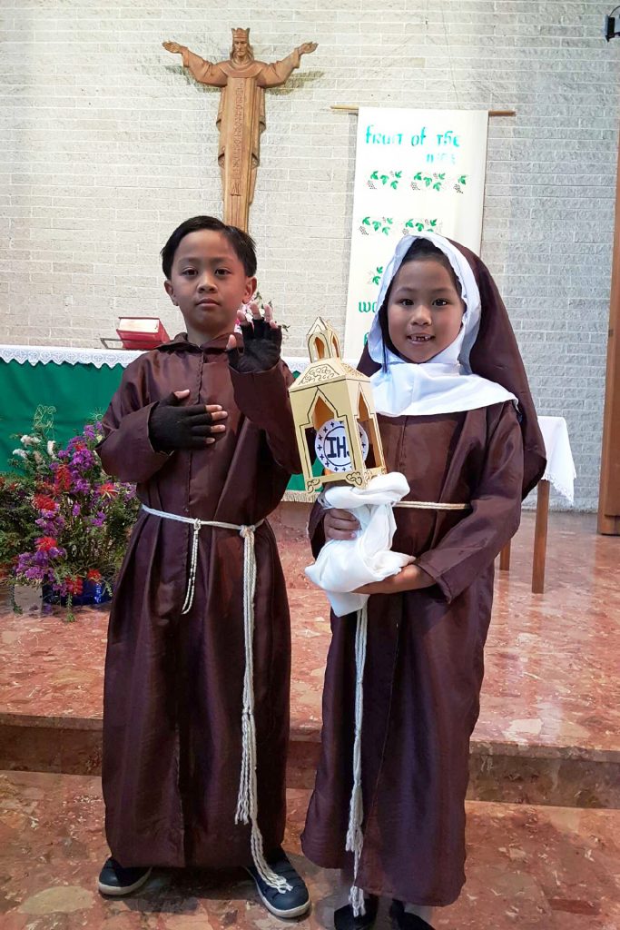Children dressed as Saint Padre Pio and St Clare of Assisi show off their costumes during the All Saints Day Parade at Midland Parish on Sunday, 30 October. Photo: Supplied