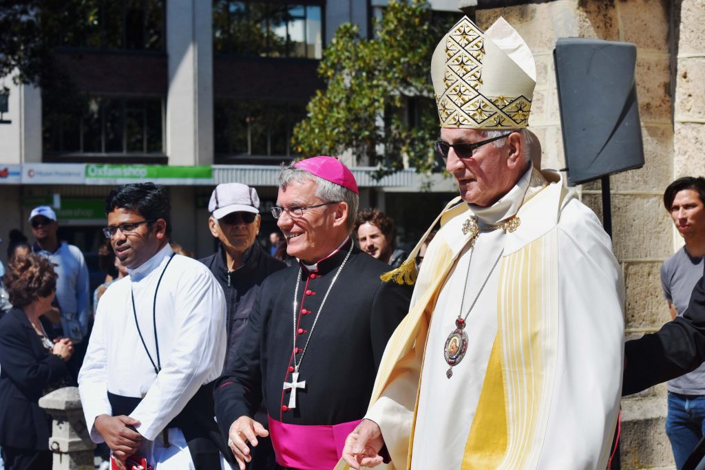 This year the procession paused at St John’s Anglican Church, where Perth Archbishop Timothy Costelloe and former Anglican Archbishop Peter Carnley met in the spirit of ecumenical communion. Photo: Daniele Foti-Cuzzola