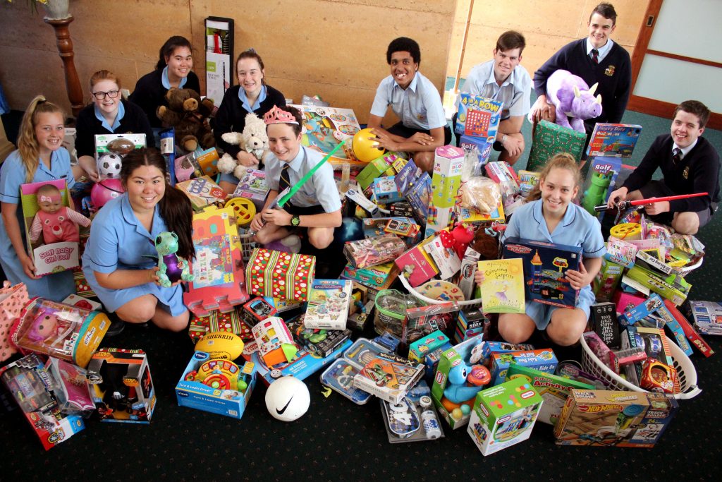 Year 10 students from Kolbe Catholic College in Rockingham with some of the toys they collected for Ronald McDonald House. Photo: Provided