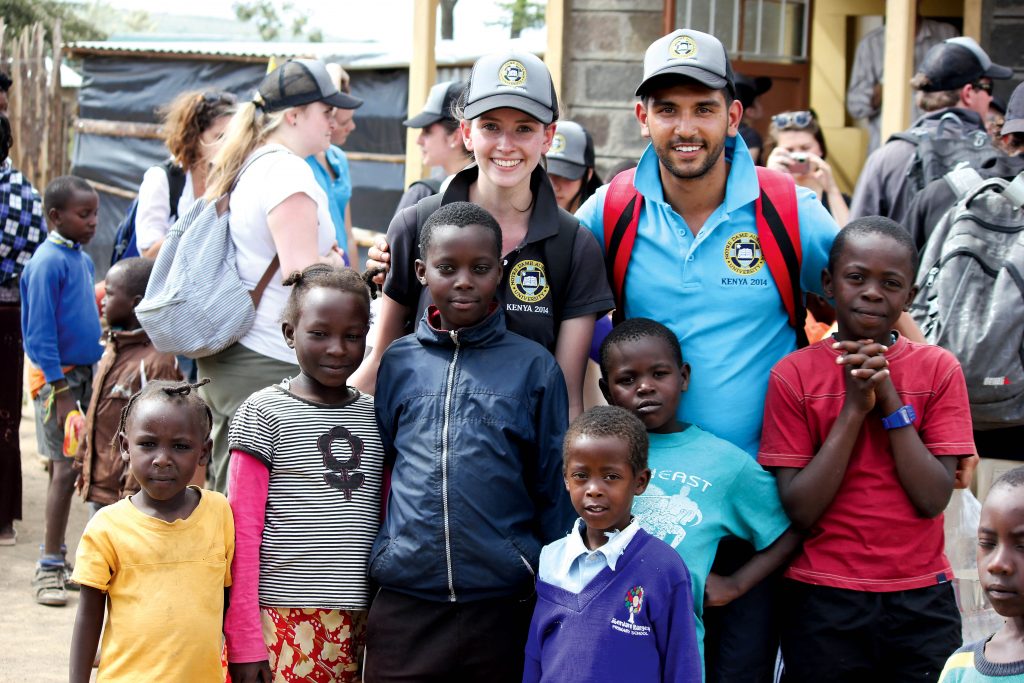 Max Agapitos (top right) took part in a service-learning experience in Kenya in 2014. He is here pictured with Notre Dame graduate, Isobel Best. Photo: Supplied