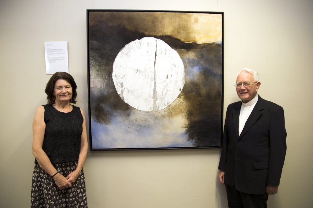 Artist Camilla Loveridge officially hands over ownership of her Mandoorla Art Award winning painting, entitled Over Jerusalem, to St Mary’s Cathedral Dean, Msgr Michael Keating. Photo: Jamie O’Brien